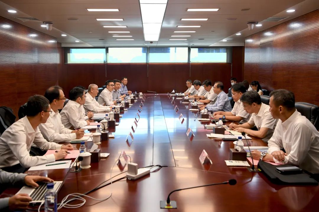 華電集團黨組書記、董事長江毅會見隆基綠能總裁李振國